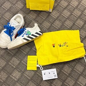 Off-White White Sneakers with Blue Laces and Green Graphic